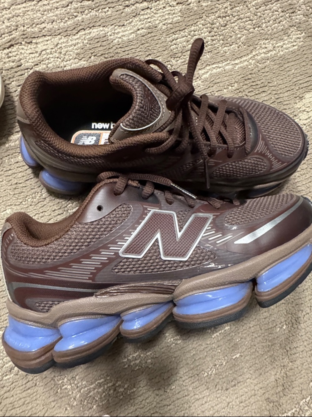 New Balance Women's Brown Athletic Shoes with Light Blue Cushioning